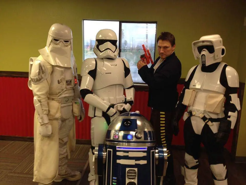 A group of people dressed as star wars characters.