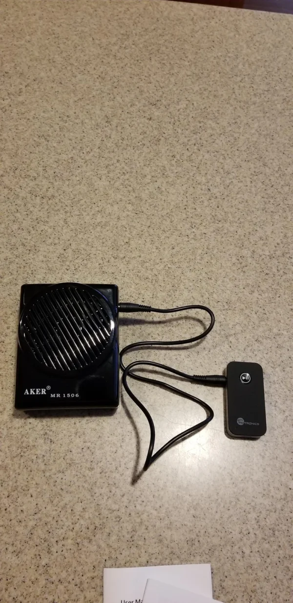 A black box sitting on top of the floor.