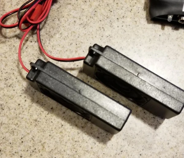 Two batteries are connected to a red wire.