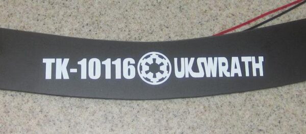 A black and white sticker with the number 1 0 1 1 6