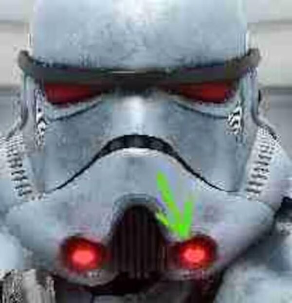 A close up of the face of an old stormtrooper