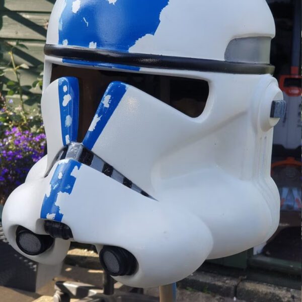 A close up of the helmet on a star wars costume